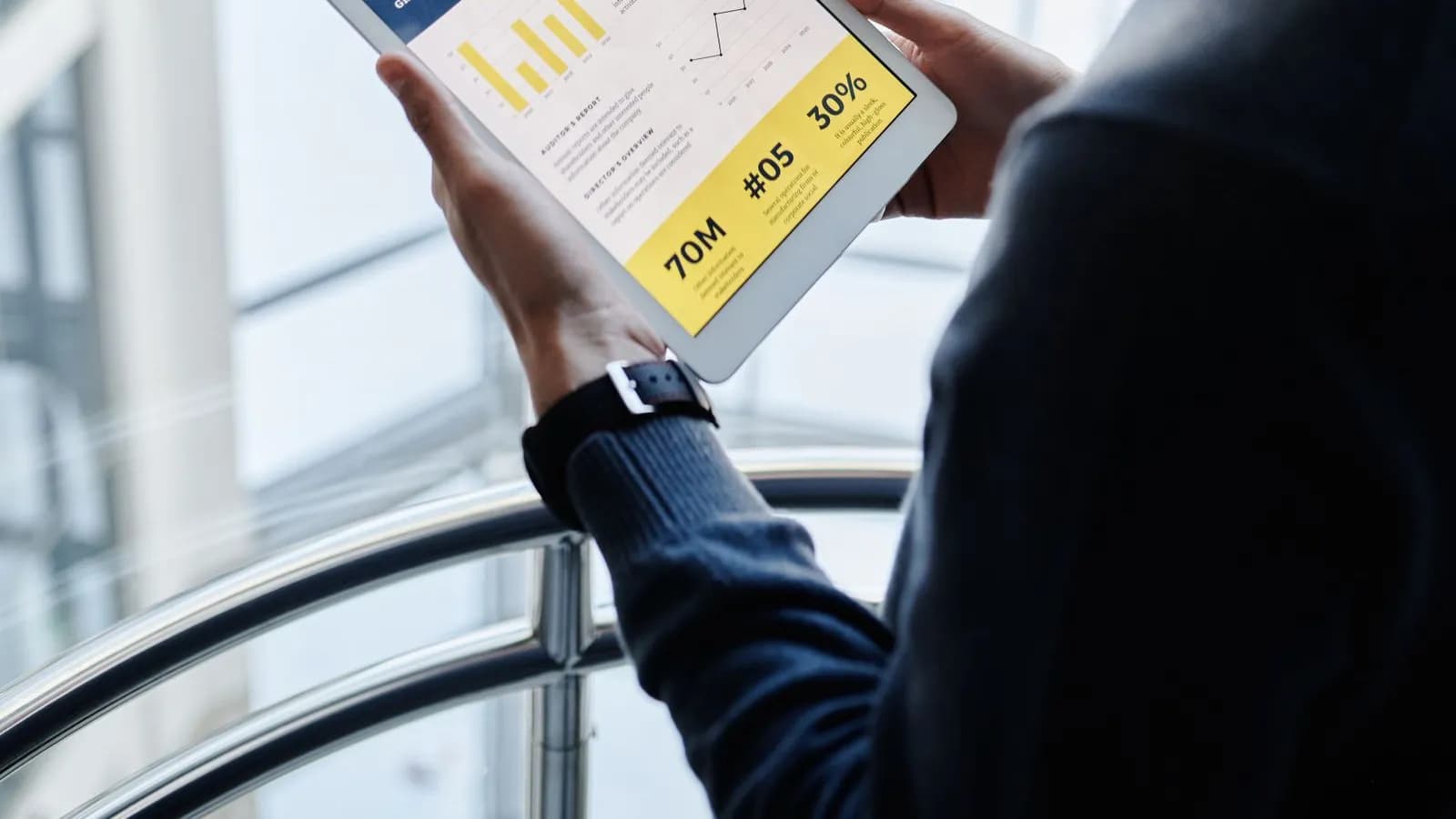 A B2B buyer researching vendors on a tablet before ever contacting sales