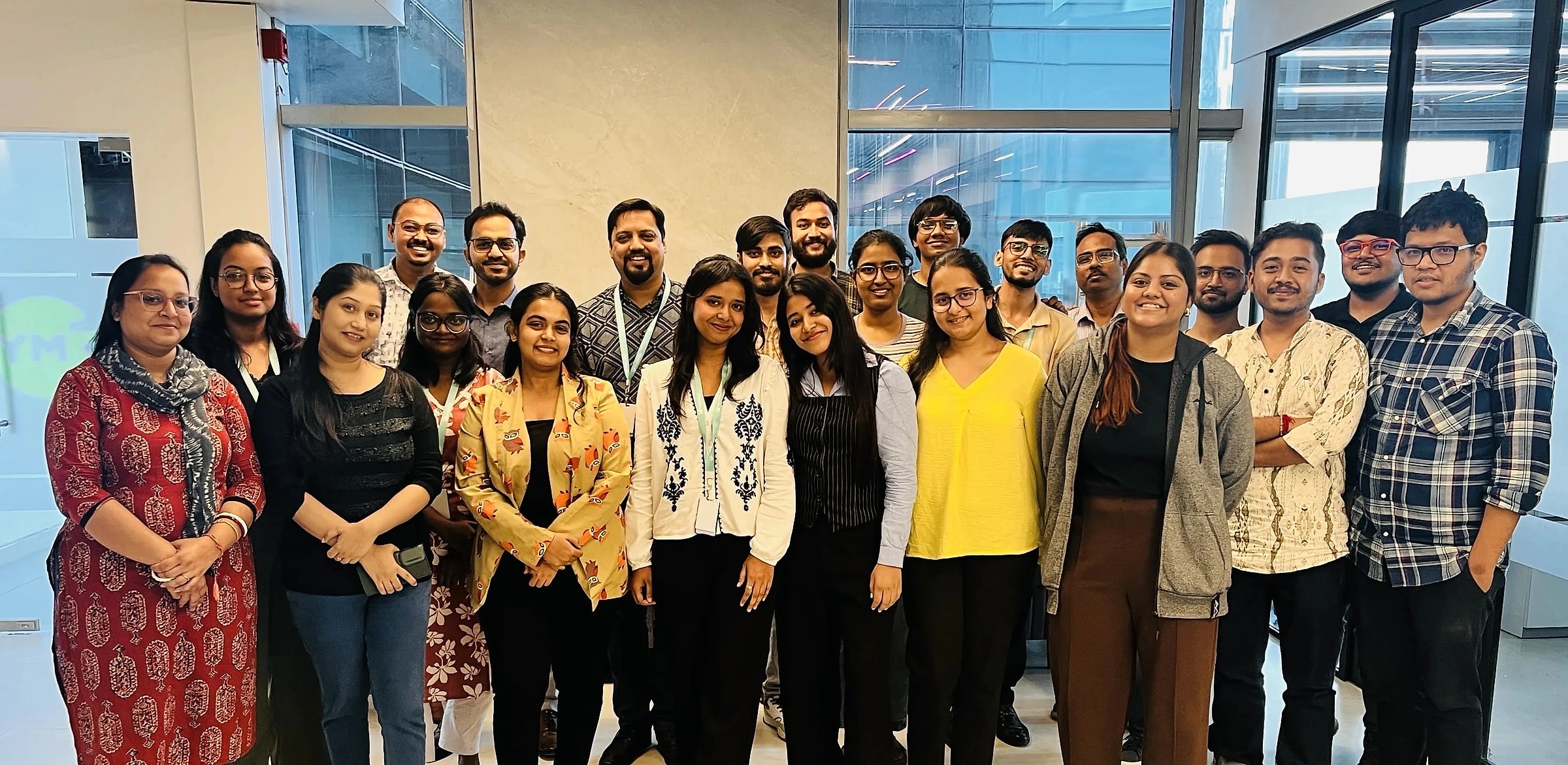 The InsightsTap team gathered together for a group photograph in the office