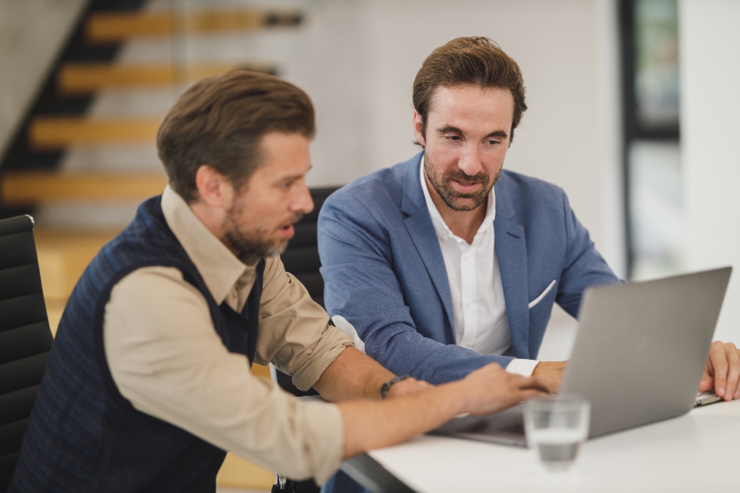 Revenue team gathered around a strategy board mapping out a signal-led go-to-market approach